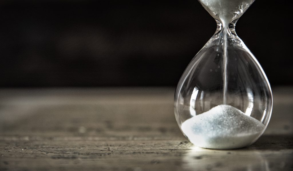 Hourglass on table